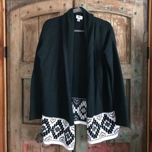 Deep green sweater with border pattern